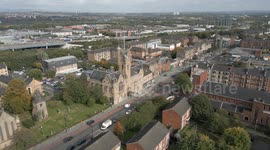 Aerial footage of Rutherglen town hall and town centre , South Lanarkshire, Scotland, UK