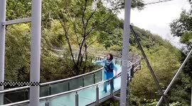 Terrified woman thrown out of capsized raft screams for help on high-altitude ride in China