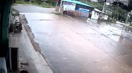 Woman runs to escape out-of-control ambulance crashing into her