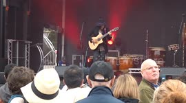 Japan Matsuri 2023 - crowds enjoy guitar wizard Hide Takemoto playing on Trafalgar Square stage
