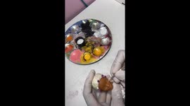 Artist erases Barbie's face and repaints it as the Little Mermaid played by Halle Bailey