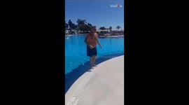 Man's excitement for swimming dissolves... just like his shorts!