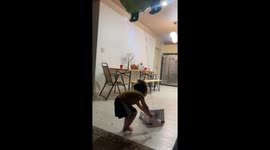Daughter Uses Stool to Reach Her Balloon