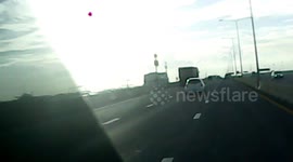 Metal rod flies from truck and smashes windscreen of car driving behind