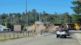 US freight train smashes into huge tractor stuck on rail crossing