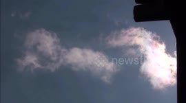Rainbow clouds over Germany and ... UFO?