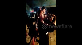 Female artist performs unique skill