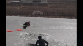Firefighters rescue two boys who fell into frozen lake