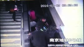 Several people fall over on escalator causing pile-up
