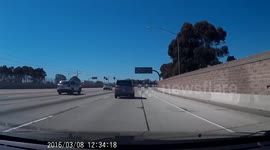 Car loses control and spins out on Los Angeles freeway