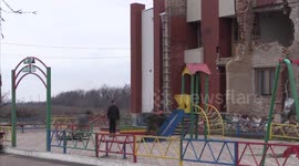 Children play in ruins of 'completely' destroyed village