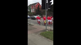 These Welsh rugby players set up a line-out on a busy road ahead of England v Wales