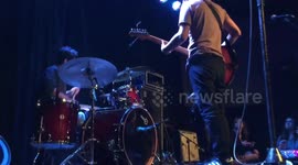 Drummer's epic fail makes guitarist rage and destroy stage