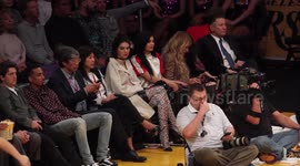 Kendall and Kylie Jenner sit courtside at the Lakers