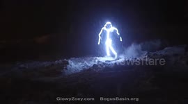 Skiers in LED suits light up the slopes