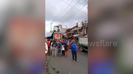Cargo truck spills hundreds of beer bottles on road