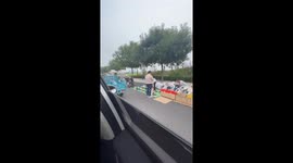 Elderly Man on Oxygen Tank Spotted to Ride on Road in China