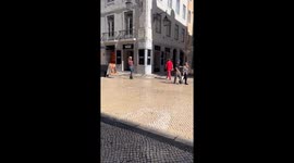 Roller skating spider woman looses her hair while doing acrobats.
