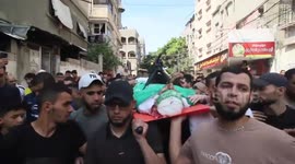 Mourners carry the bodies of Palestinians killed in the latest infiltration operation into Israel
