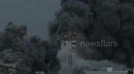 Building collapses in Gaza after Israeli airstrike