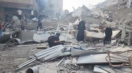 Scenes from the bombing of Watan Tower in central Gaza