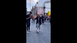 Women fall on a ball