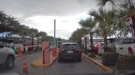 Car park barrier whacks pedestrian in the face