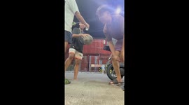 Youngsters play with basketball set on fire