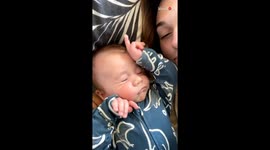 Baby boy gives fierce stare to camera after finding himself being recorded in morning