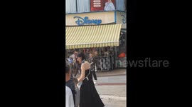 Parrot Sitting on It's Owner Shoulder During A Walk in Sichuan, China