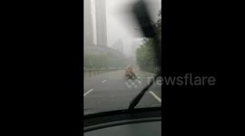 Fountain from Sewer during a Storm in  Xi'An, China