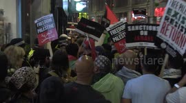 Palestine supporters and police scuffle in London, liquids and bottles thrown towards officers