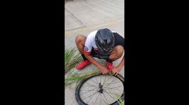 Cycling hack! Biker stuffs punctured wheel with long grass
