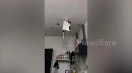 Ceiling collapses as water pours through during rainstorm in Thailand