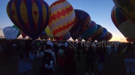 Fleet of balloons take to skies in New Mexico as International Balloon Fiesta gets underway