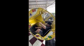 Thrilling ride at Dream World Amusement Park: hilarious screams and balancing act!