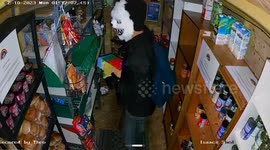 Chilling CCTV shows thief in Halloween panda mask stealing from boy's foodbank