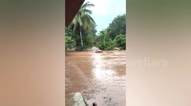 Garden jar drifts in deluge as disastrous flood hits northeast Thailand