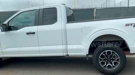 Homeless ram parked car and try a jump the battery to get away