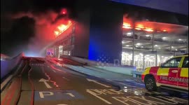 Fire Rips Through Car Park At Luton Airport, UK