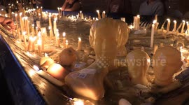 Faithful attend the candle room at the National Sanctuary of Aparecida in Sao Paulo, Brazil
