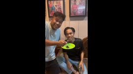Hilarious mishap at Nazmi's birthday: Nazriq's cake-toppling tumble