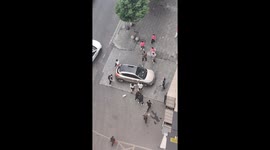 Pedestrians rescue child trapped under car in China
