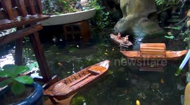Vietnamese sculptor builds fascinating models of wooden stilt houses