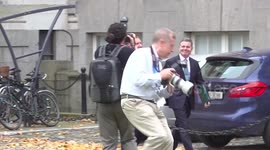 Michael McGrath and Pascal Donohoe bring the new Irish Budget into government buildings in Dublin, Ireland