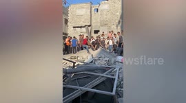 Palestinians search  for survivors trapped in rubble amid Israeli onslaught