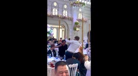 Chinese uncle and French man steal the show with joyful wedding dance