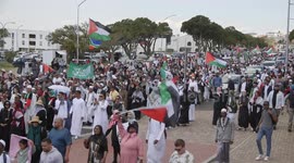 1000's march against israeli attack and blockade on gaza , Mandela dubs it a genocide of Palestinians