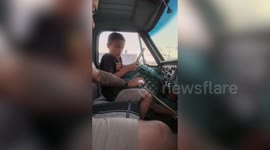 Dad taught eleven-year-old son how to drive - and caught the moment on camera