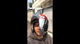 Helmet visor shattered: riding with a broken shield in Pontianak, Indonesia